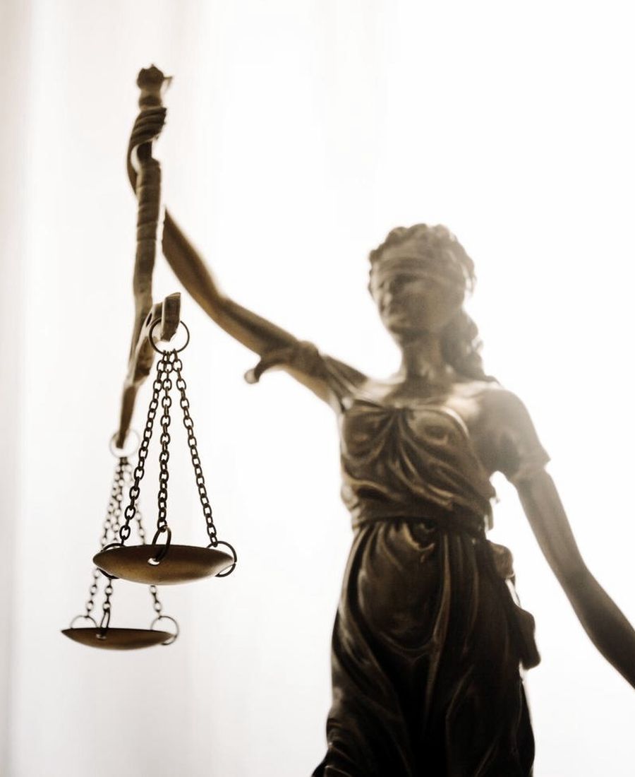 Scales of justice in the Berthold Law Firm office